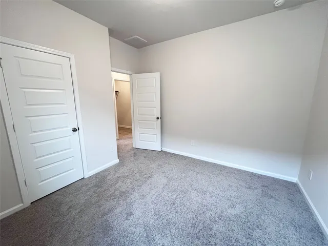 an empty room with closet