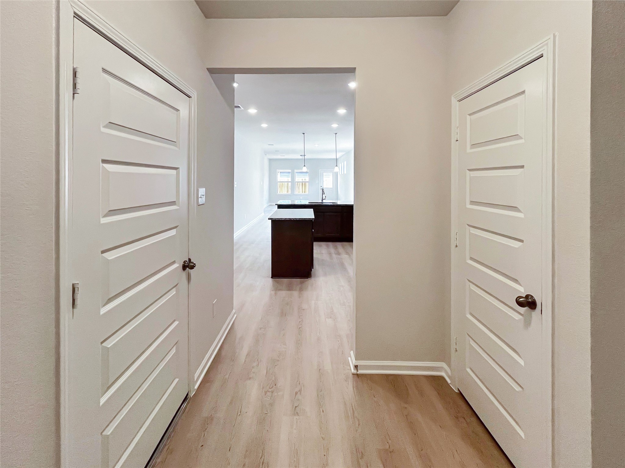 321 Stone Placa Trail Pattison, TX 77423 - Photo 3 of 19 a view of a hallway with wooden floor and staircase