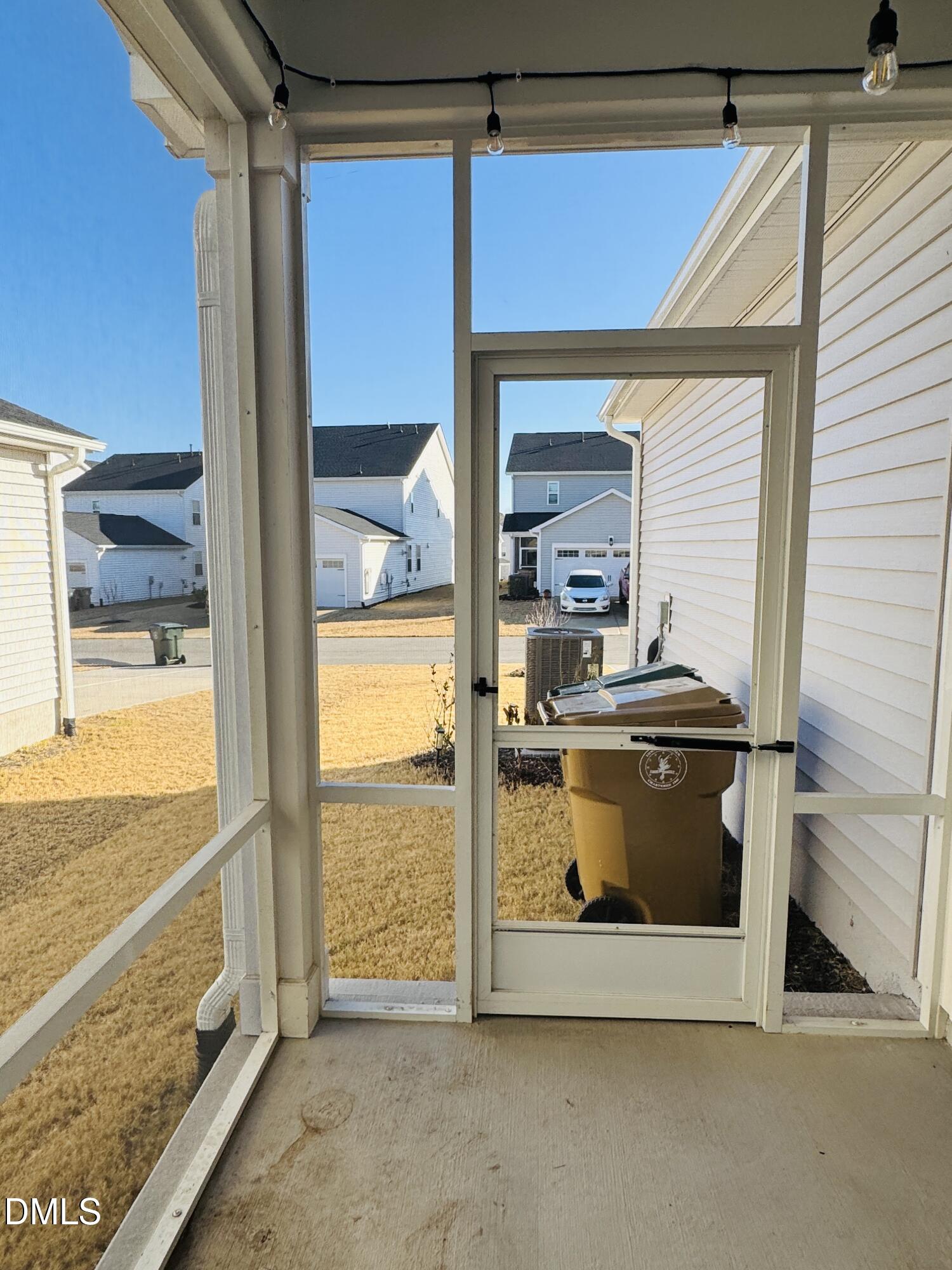 292 Edge Of Auburn Boulevard Raleigh, NC 27610 - Photo 18 of 38 a view of living room with a floor to ceiling window and an oven