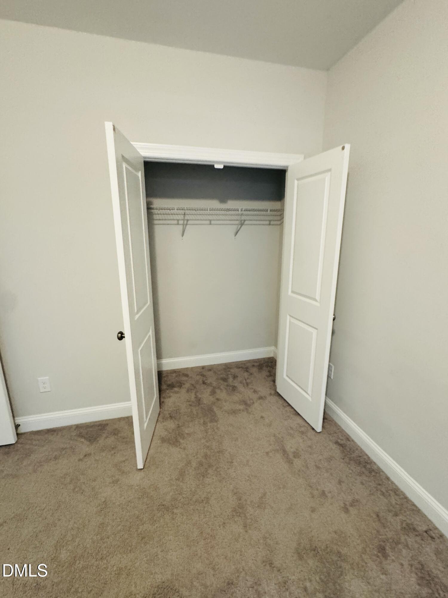 292 Edge Of Auburn Boulevard Raleigh, NC 27610 - Photo 27 of 38 an empty room with a door