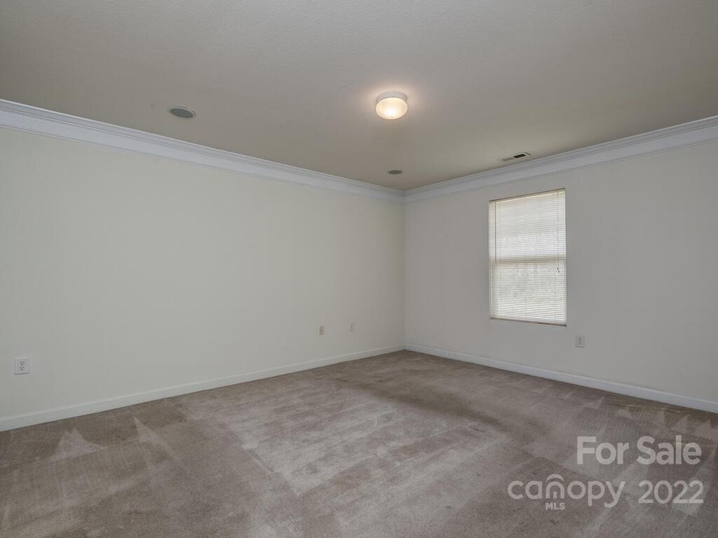3036 Proverbs Court Monroe, NC 28110 - Photo 12 of 18 an empty room with a window