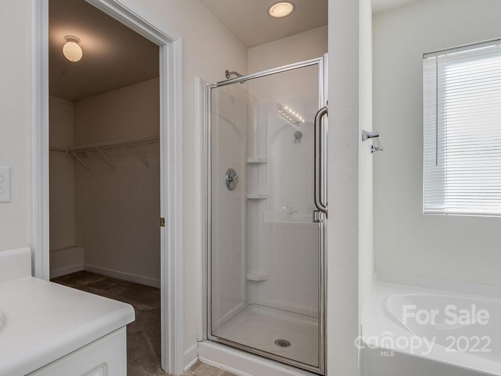 3036 Proverbs Court Monroe, NC 28110 - Photo 15 of 18 a bathroom with a shower