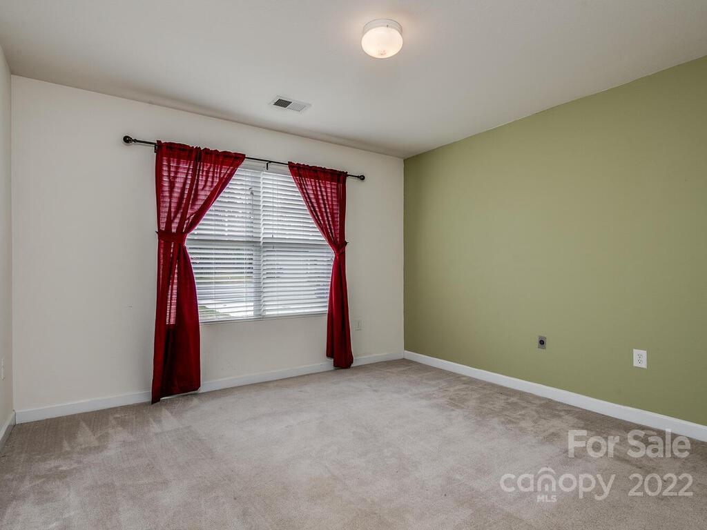 3036 Proverbs Court Monroe, NC 28110 - Photo 4 of 18 an empty room with a window