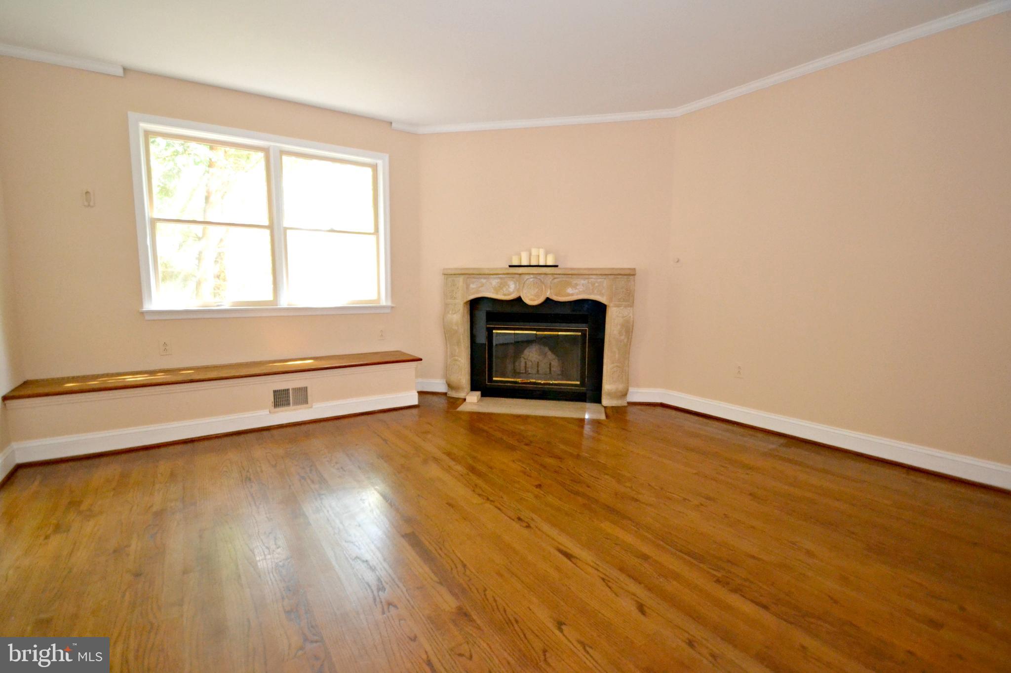 6906 Avondale Road Baltimore, MD 21212 - Photo 18 of 46 Family room with fireplace
