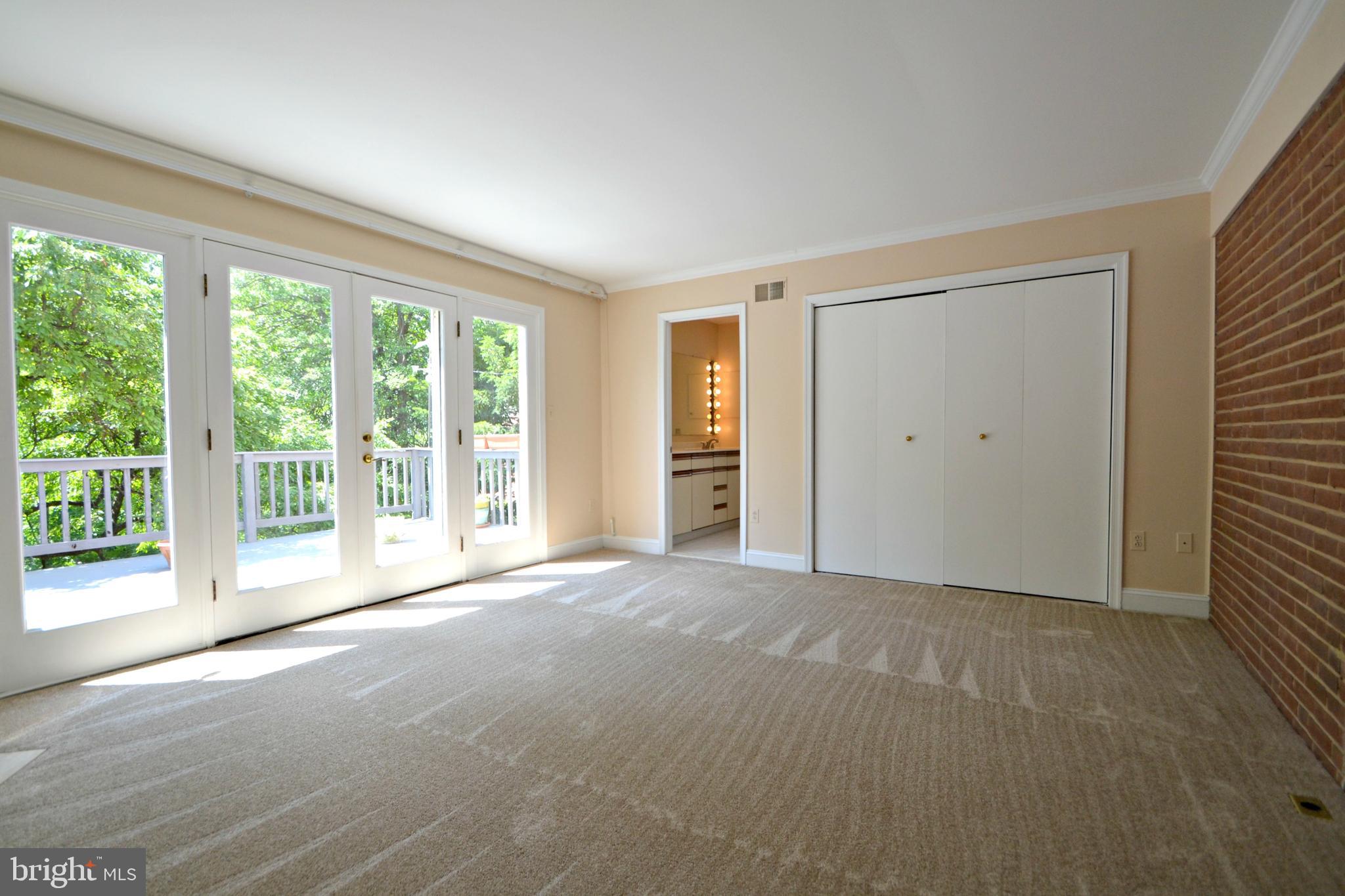 6906 Avondale Road Baltimore, MD 21212 - Photo 24 of 46 Owners suite with doors to rear deck