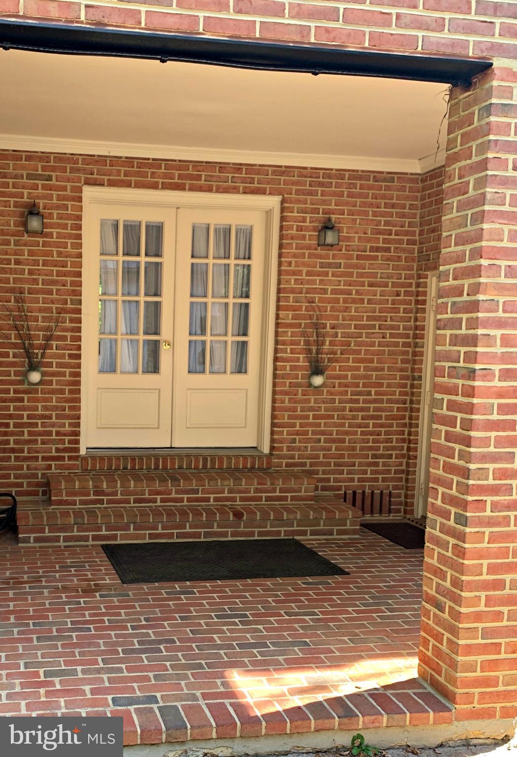 6906 Avondale Road Baltimore, MD 21212 - Photo 39 of 46 Brick porch on side with access to family room