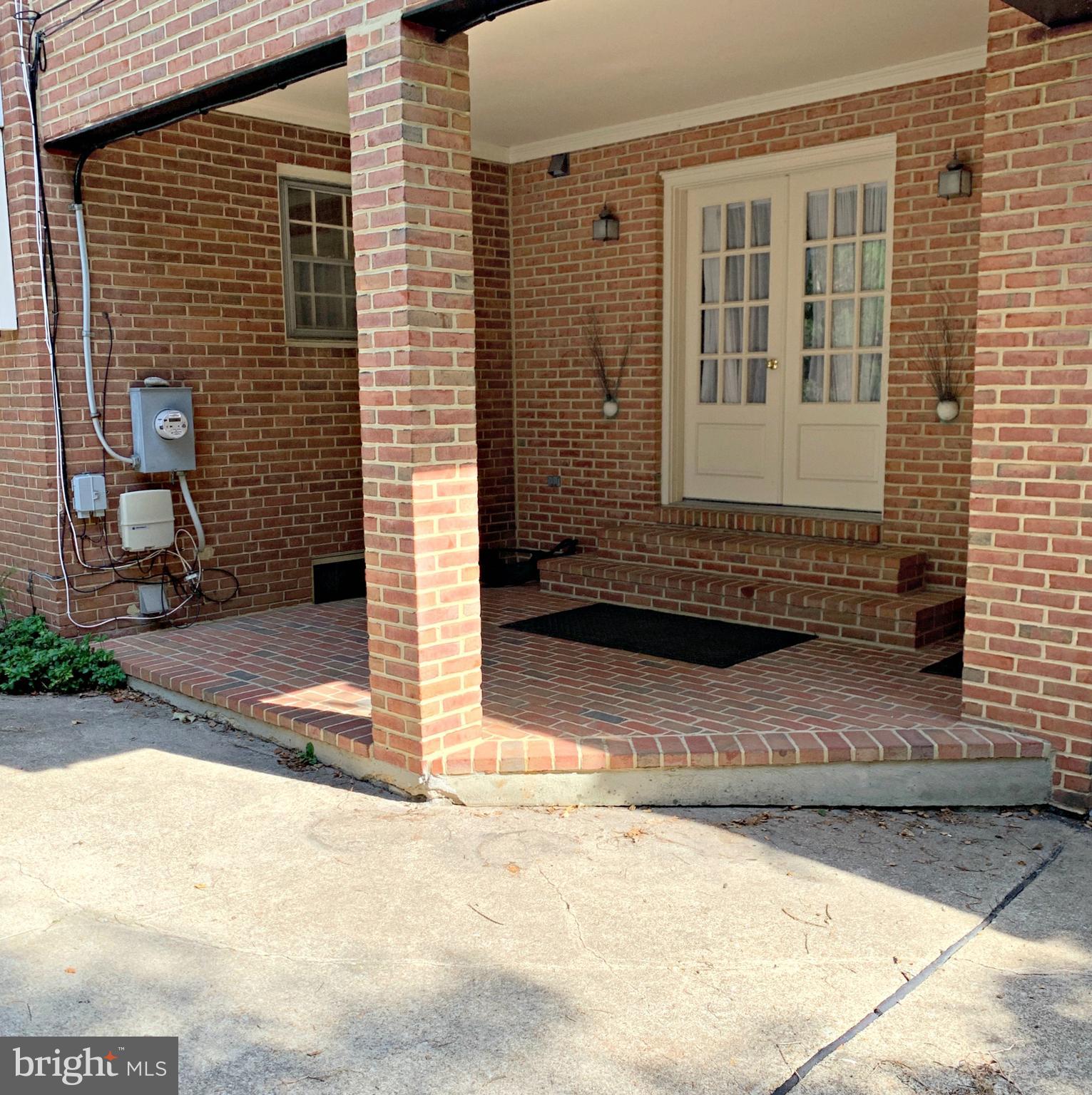 6906 Avondale Road Baltimore, MD 21212 - Photo 40 of 46 Brick porch on side with access to family room