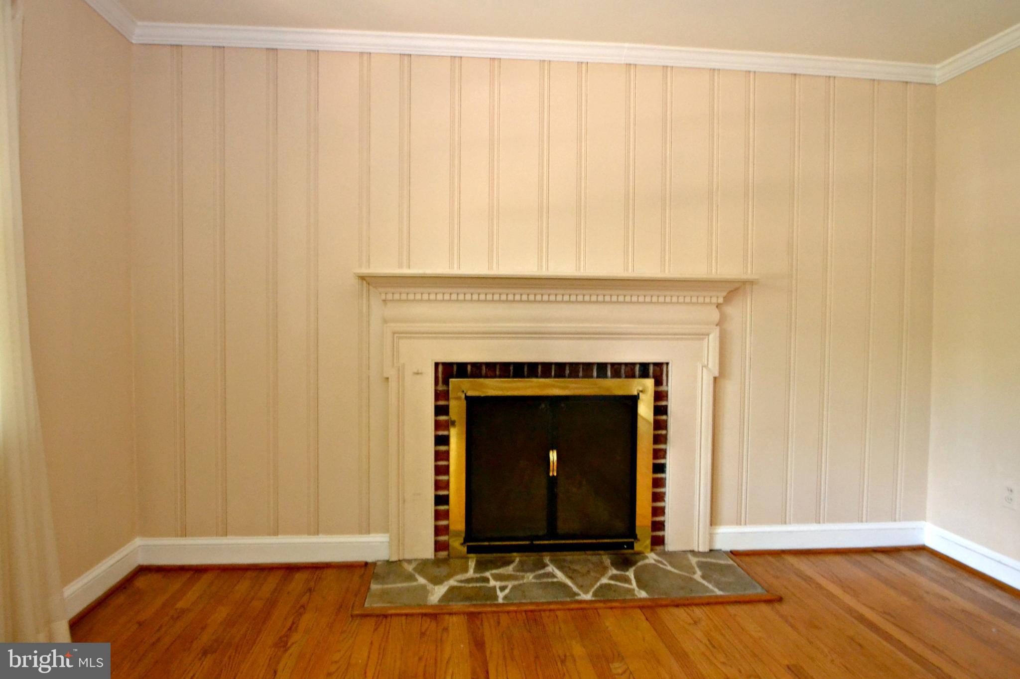 6906 Avondale Road Baltimore, MD 21212 - Photo 5 of 46 Living room fireplace
