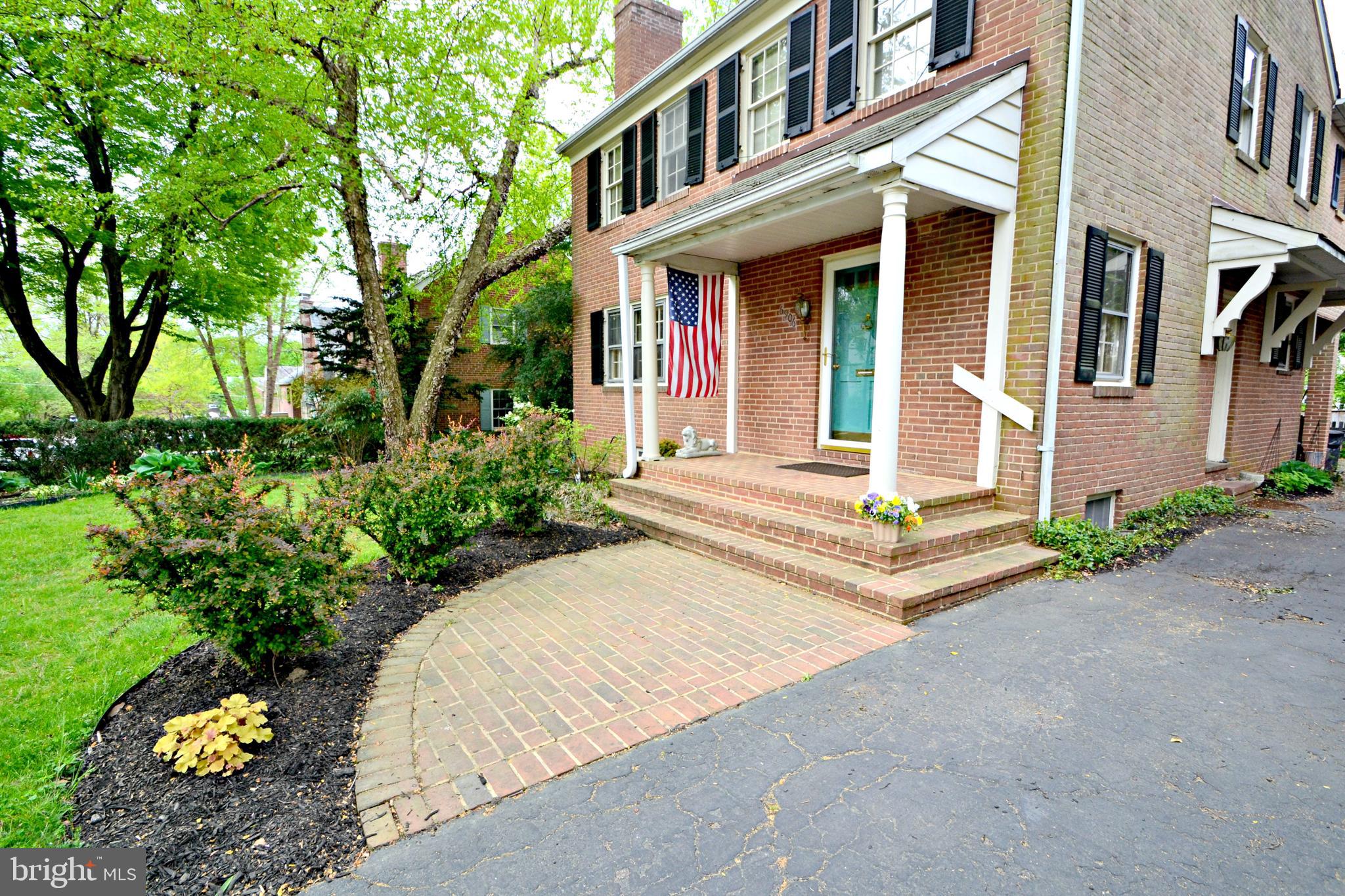 6906 Avondale Road Baltimore, MD 21212 - Photo 42 of 46 Brick walkway and covered front porch
