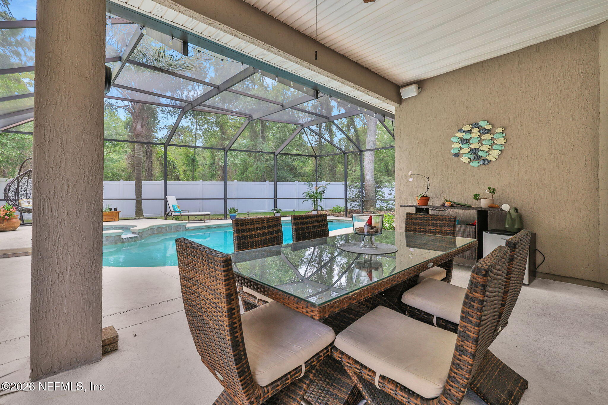 4320 Rye Court St. Johns, FL 32259 - Photo 47 of 60 a dining room with furniture and a floor to ceiling window