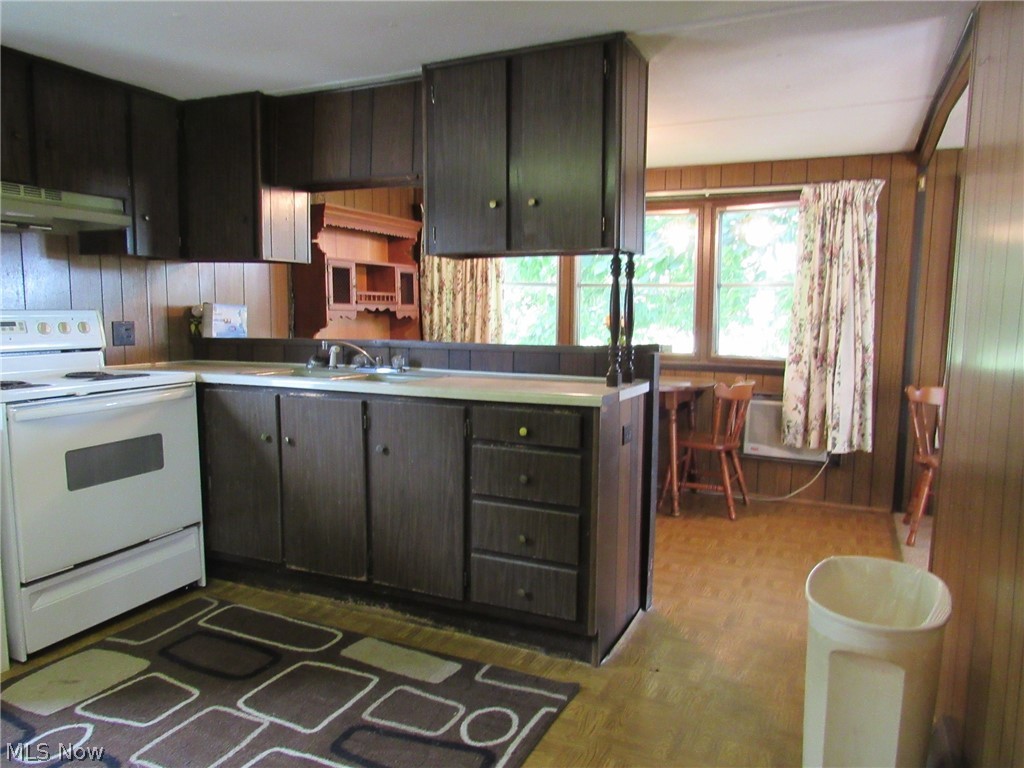 1575 Dodgeville Road Rome, OH 44085 - Photo 5 of 26 Kitchen is bright and open to eat-in area as well as the living room.