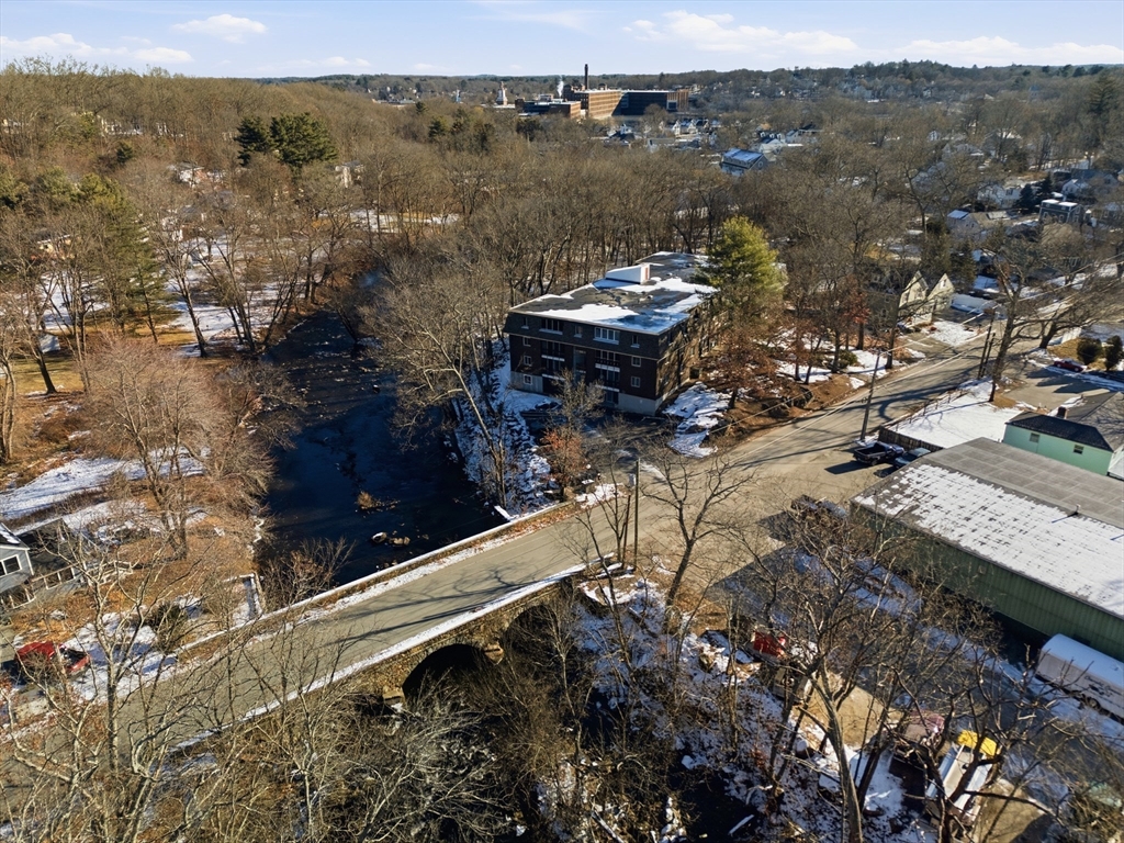 10 Mill Street, Unit Q Maynard, MA 01754 - Photo 30 of 31 a view of a lake with a mountain