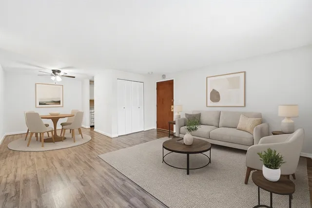 a living room with furniture and a table