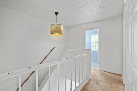 a view of an entryway with a window