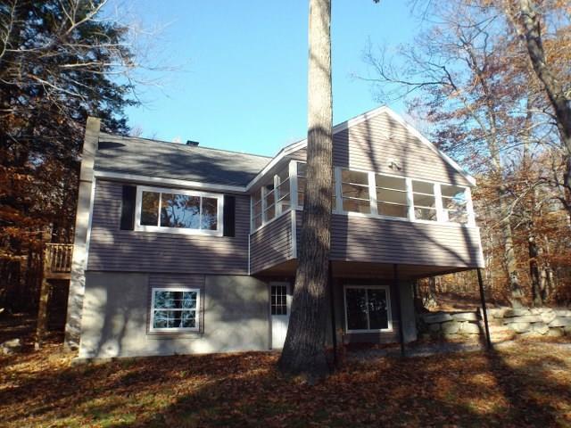 69 Rocky Point Road Harrison, ME 04040 - Photo 5 of 29 House and porch that overlooks the lake