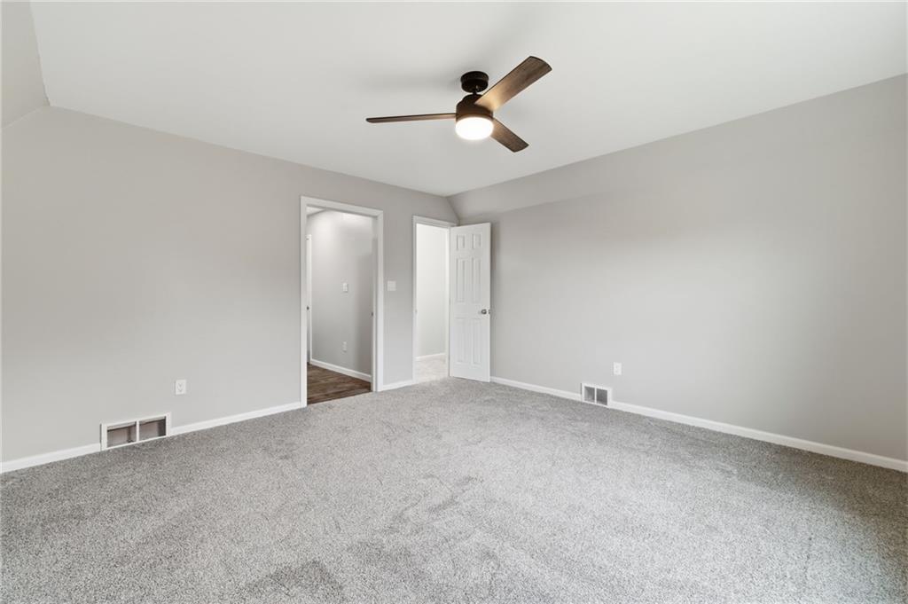2104 Pulaski Road New Castle, PA 16105 - Photo 27 of 29 a view of an empty room with a ceiling fan
