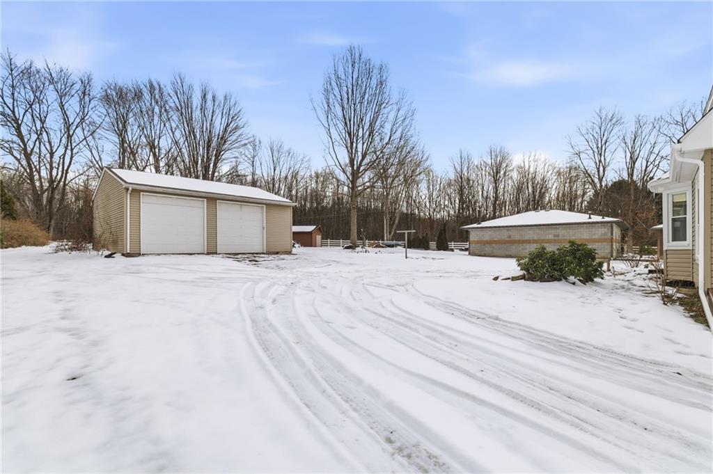2104 Pulaski Road New Castle, PA 16105 - Photo 4 of 29 a view of a house with snow on the road