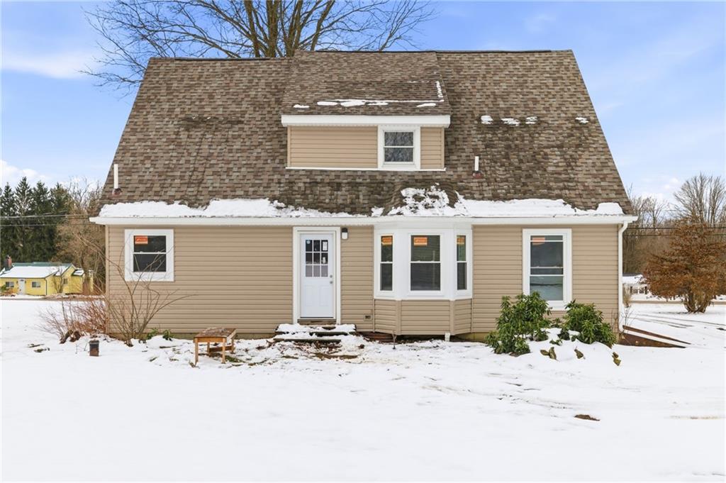 2104 Pulaski Road New Castle, PA 16105 - Photo 5 of 29 a front view of a house with a yard