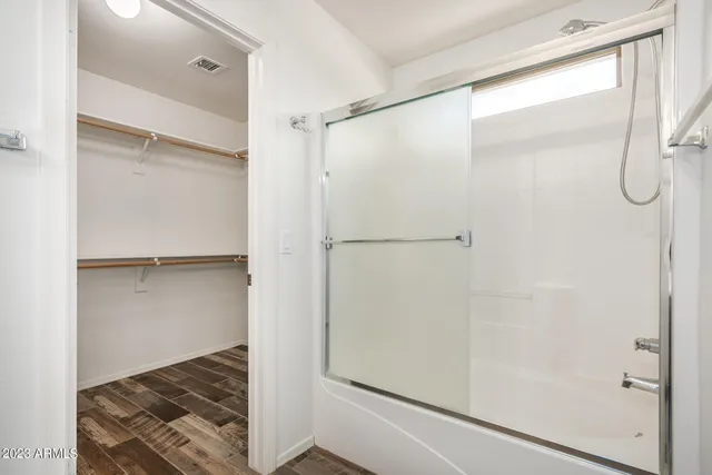 a view of an empty room with a window