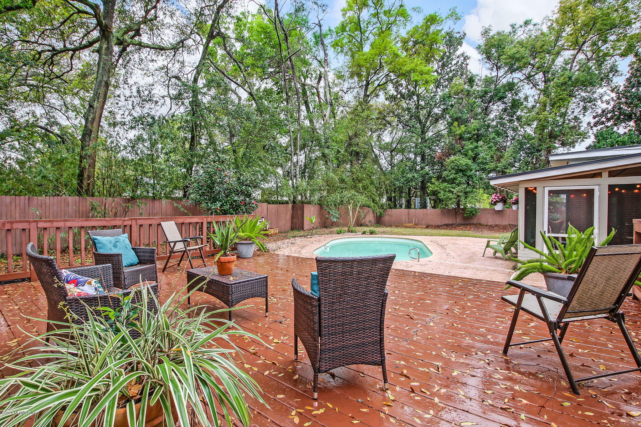 1824 Cornell Road Jacksonville, FL 32207 - Photo 4 of 29 a view of a chairs and table in the patio