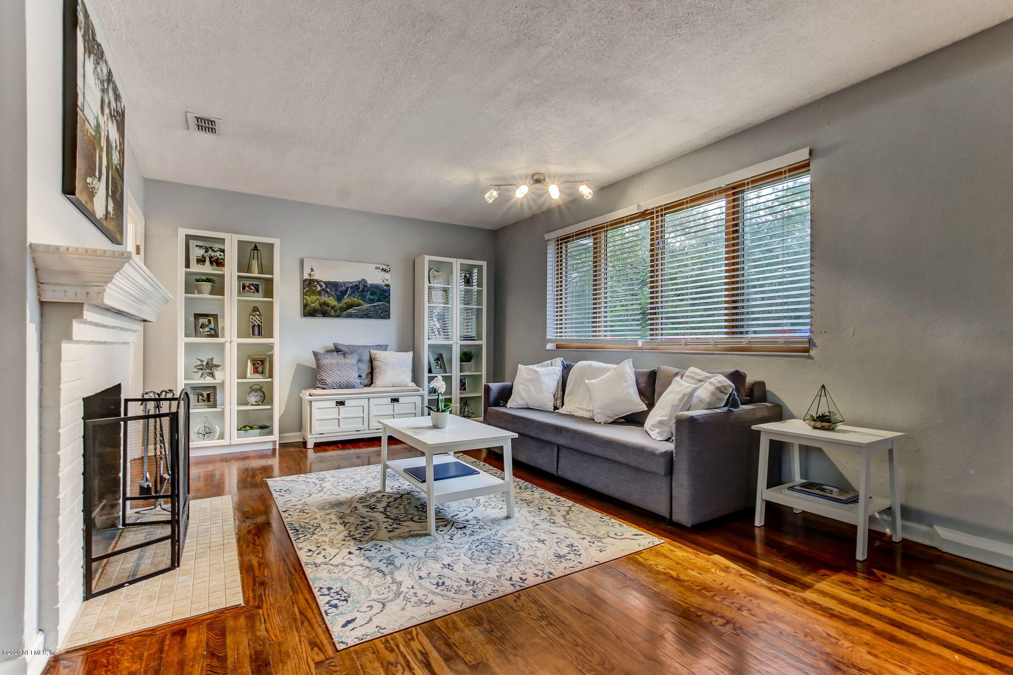 1824 Cornell Road Jacksonville, FL 32207 - Photo 8 of 29 a living room with furniture and a rug