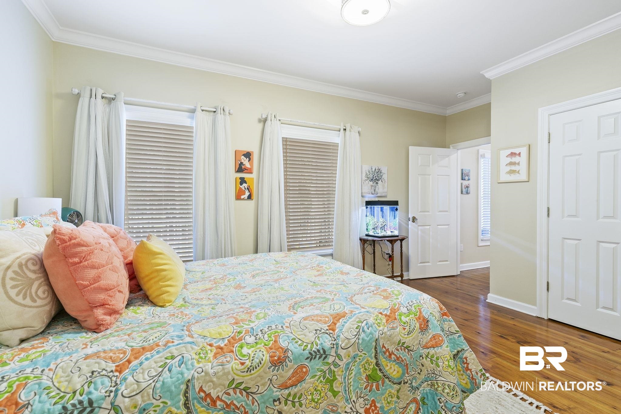 17341 Cabin Road Loxley, AL 36551 - Photo 24 of 49 Bedroom with dark wood-type flooring and crown molding