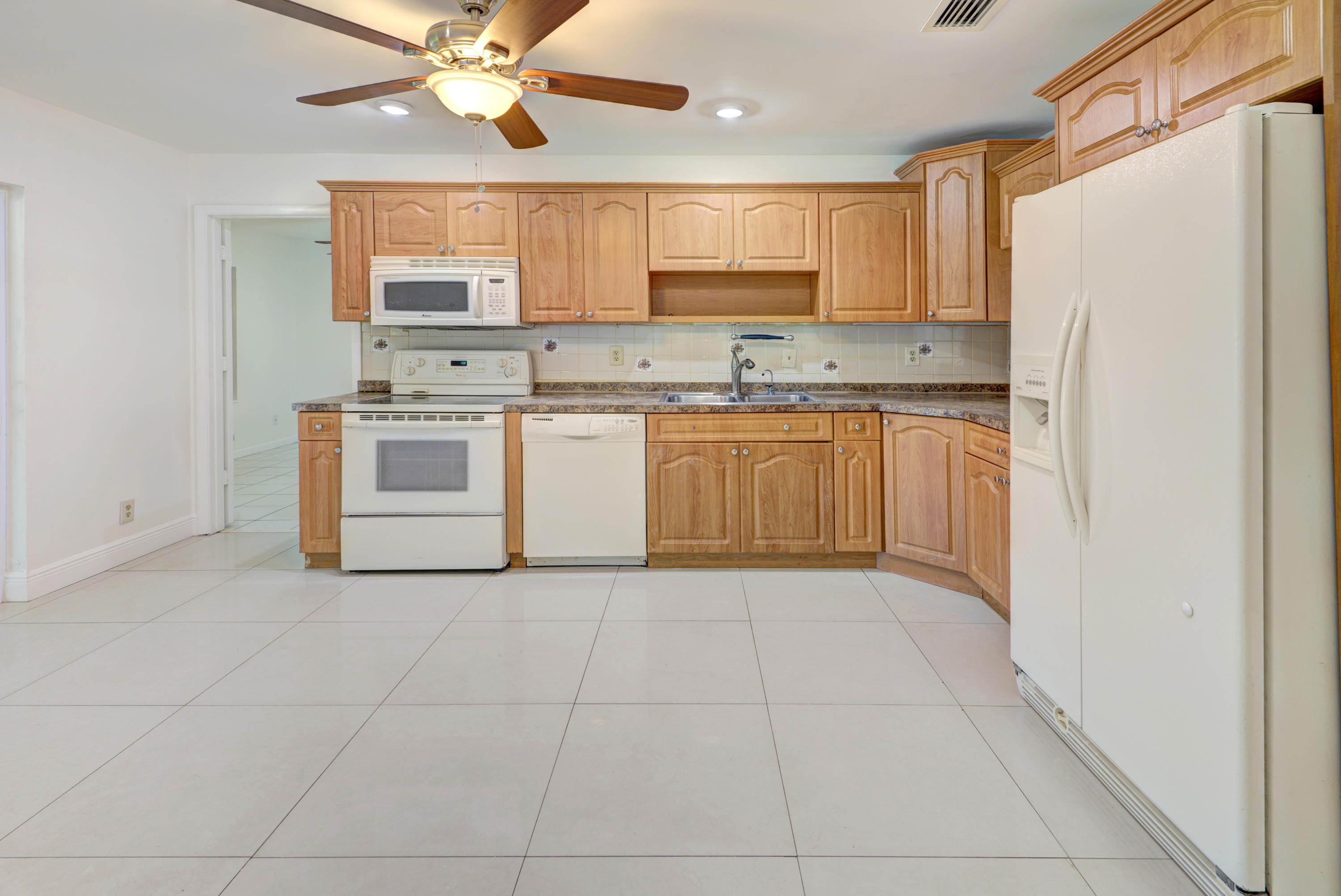 5936 Westfall Road Lake Worth, FL 33463 - Photo 3 of 22 Kitchen