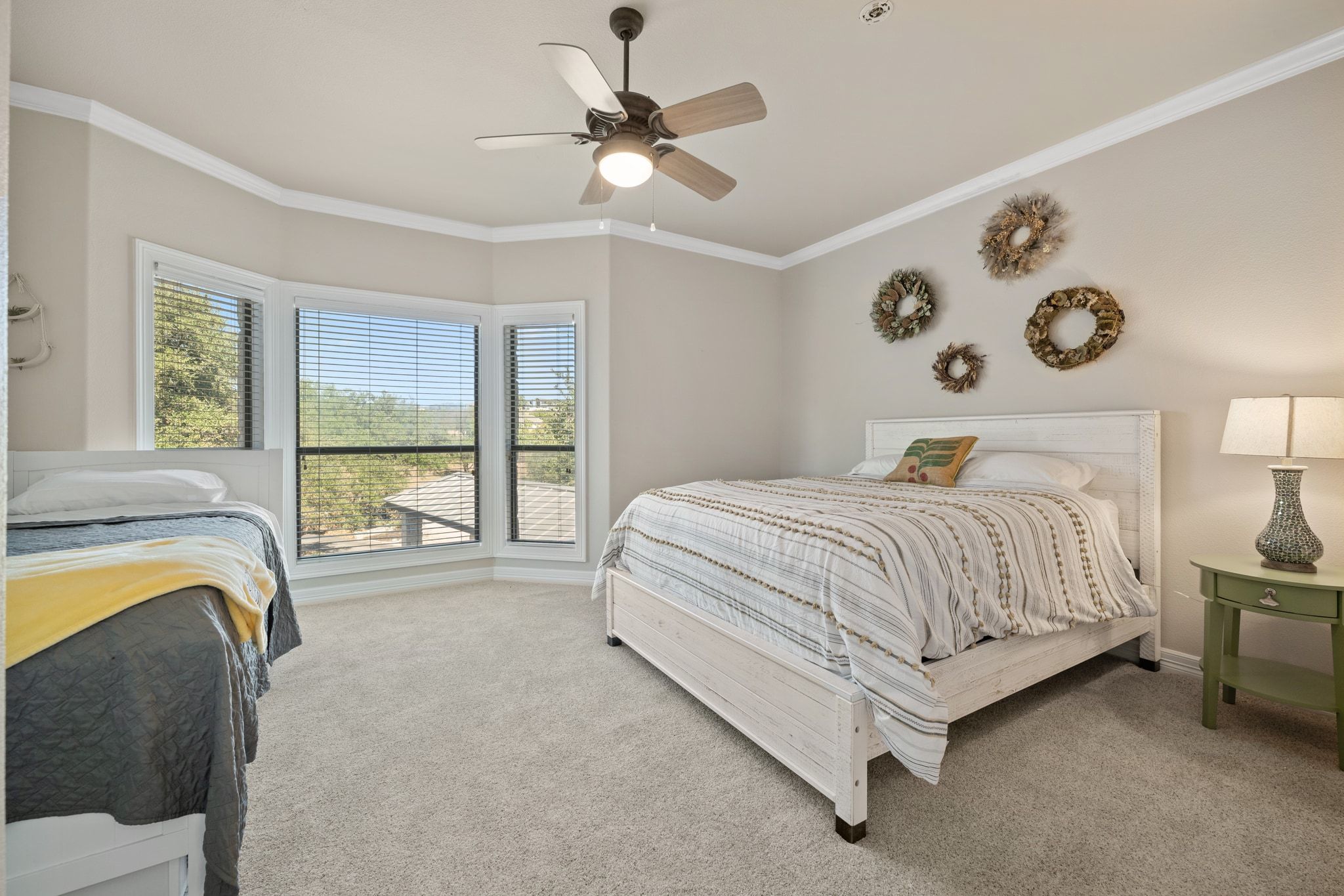 185 Shimmering Shore Court Spring Branch, TX 78070 - Photo 22 of 36 Bedroom featuring carpet floors, ceiling fan, and crown molding