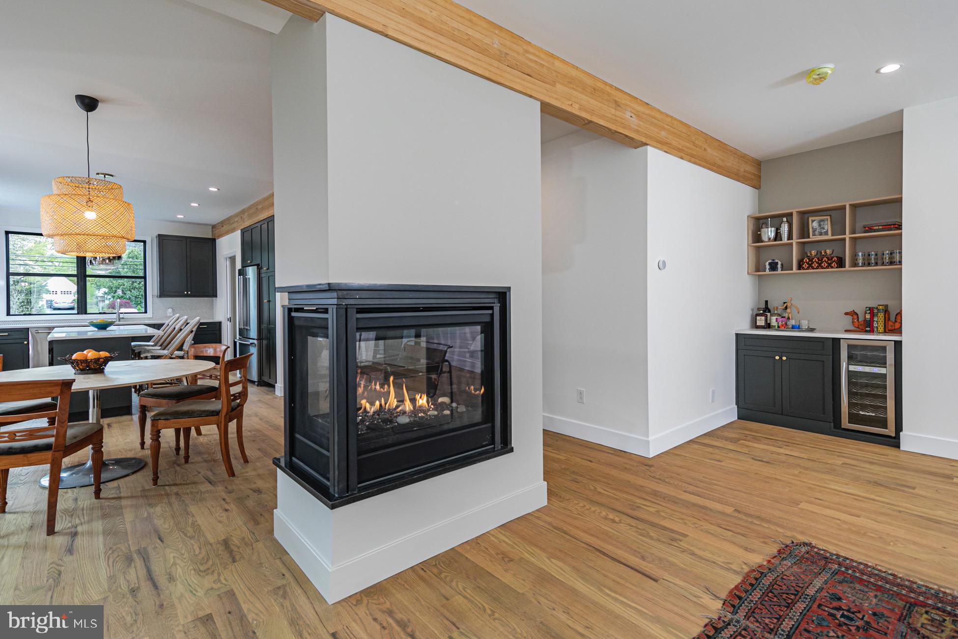 76 Valley Road Princeton, NJ 08540 - Photo 7 of 22 3 -sided gas fireplace and dry bar