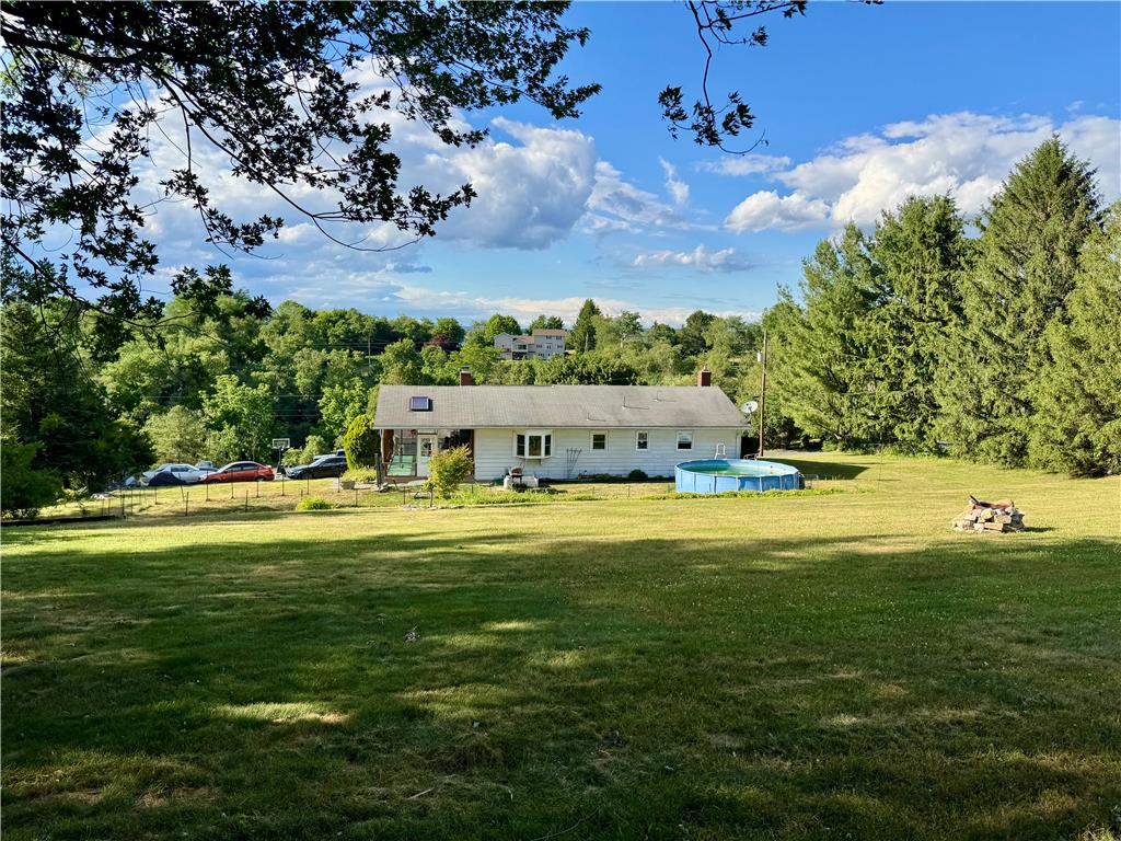 5054 Mill Road Schnecksville, PA 18078 - Photo 6 of 29 a front view of a house with a big yard