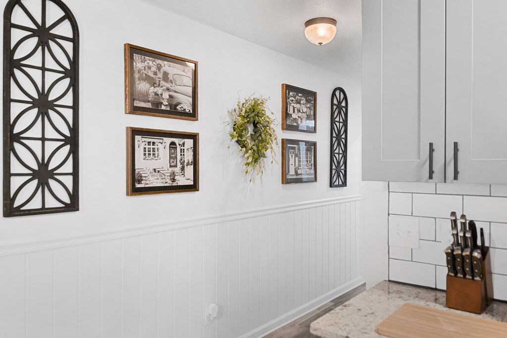 45 Wilderness Trail Blue Ridge, GA 30513 - Photo 32 of 58 a view of a hallway with paintings on the wall