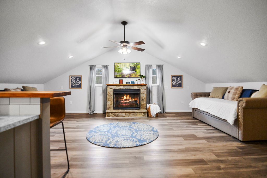 45 Wilderness Trail Blue Ridge, GA 30513 - Photo 46 of 58 a living room with furniture and a fireplace