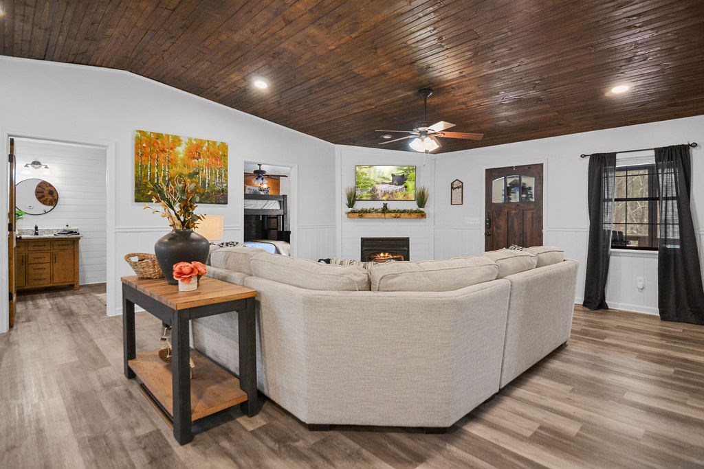 45 Wilderness Trail Blue Ridge, GA 30513 - Photo 9 of 58 a living room with furniture and a flat screen tv