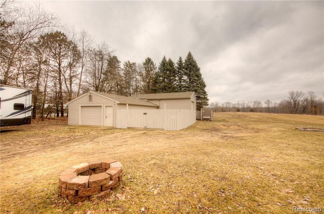 9213 Coleman Road Haslett, MI 48840 - Photo 60 of 99 Fire Pit and Barn