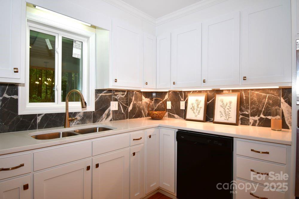 2171 John G Richards Road Camden, SC 29020 - Photo 14 of 21 a kitchen with a sink and cabinets