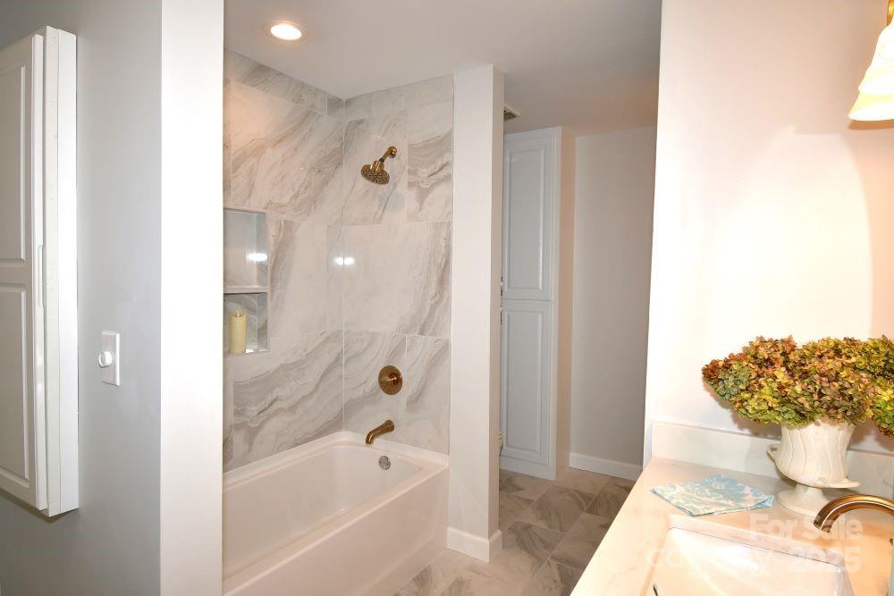 2171 John G Richards Road Camden, SC 29020 - Photo 21 of 21 a bathroom with a bathtub and a shower