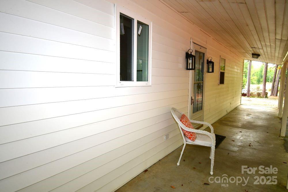 2171 John G Richards Road Camden, SC 29020 - Photo 4 of 21 a bench sitting in front of a building