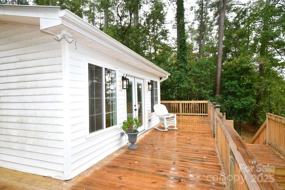 2171 John G Richards Road Camden, SC 29020 - Photo 5 of 21 a view of house with backyard and seating area