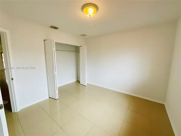 an empty room with a natural light