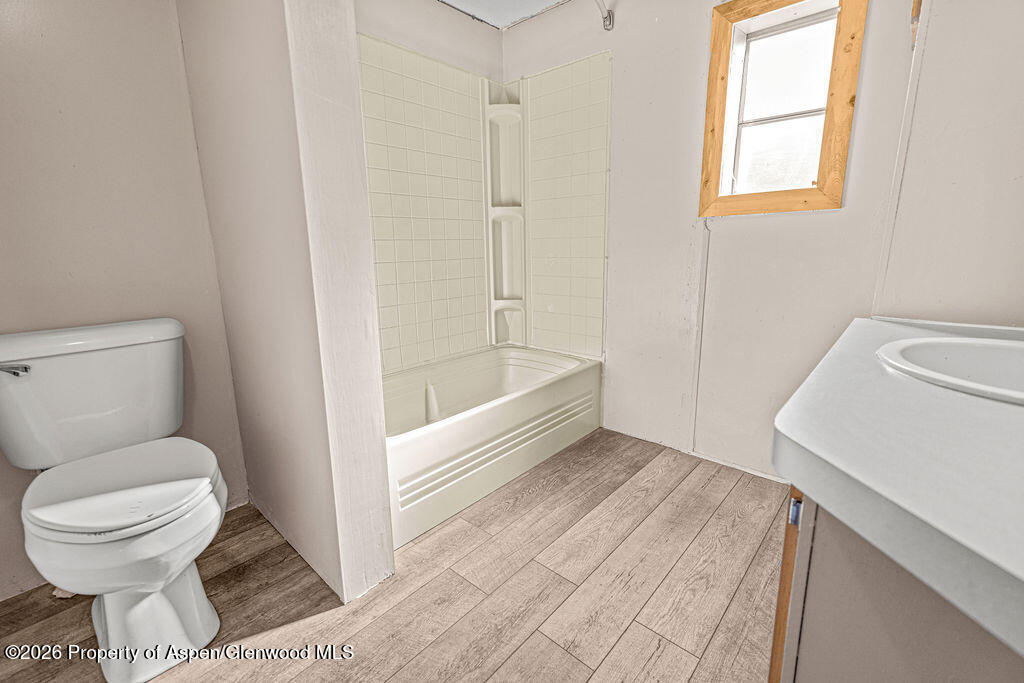 2210 West 3rd Street, Unit 38 Craig, CO 81625 - Photo 12 of 22 a bathroom with a toilet and a shower