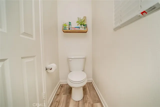 a bathroom with a toilet and a sink