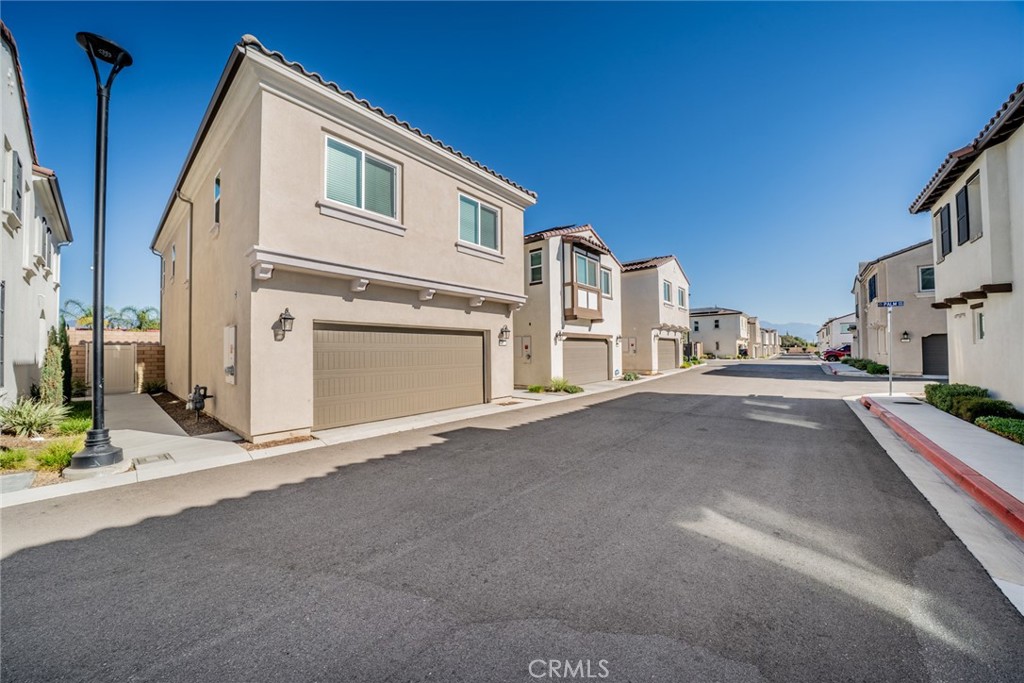 214 Bonita Lane Rialto, CA 92376 - Photo 4 of 51 a view of multiple house with garage