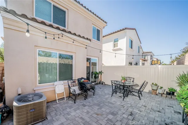 an aerial view of residential houses and outdoor space