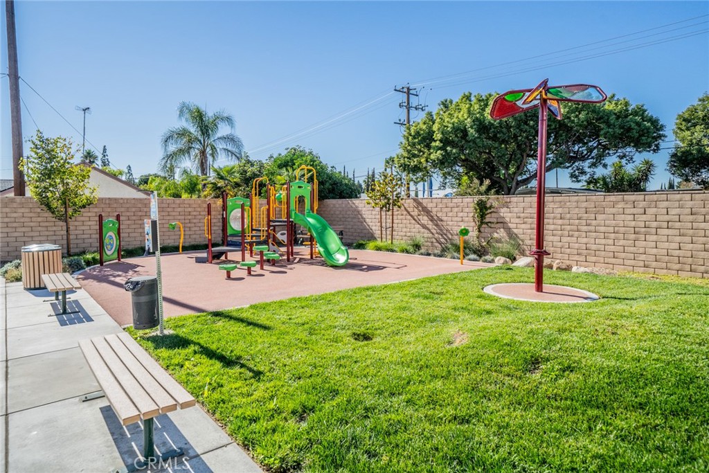 214 Bonita Lane Rialto, CA 92376 - Photo 43 of 51 a view of a garden with a slide