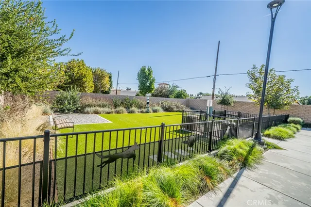 a view of a balcony with yard