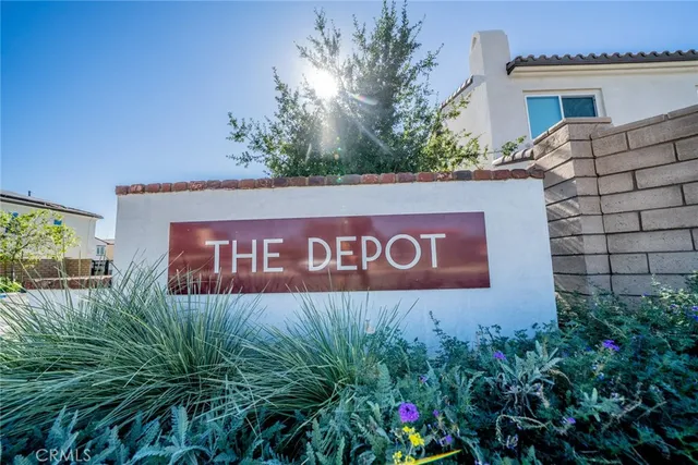 a balcony with view of the house