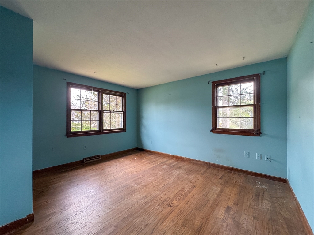 60 White Fox Road Feeding Hills, MA 01030 - Photo 14 of 29 an empty room with windows