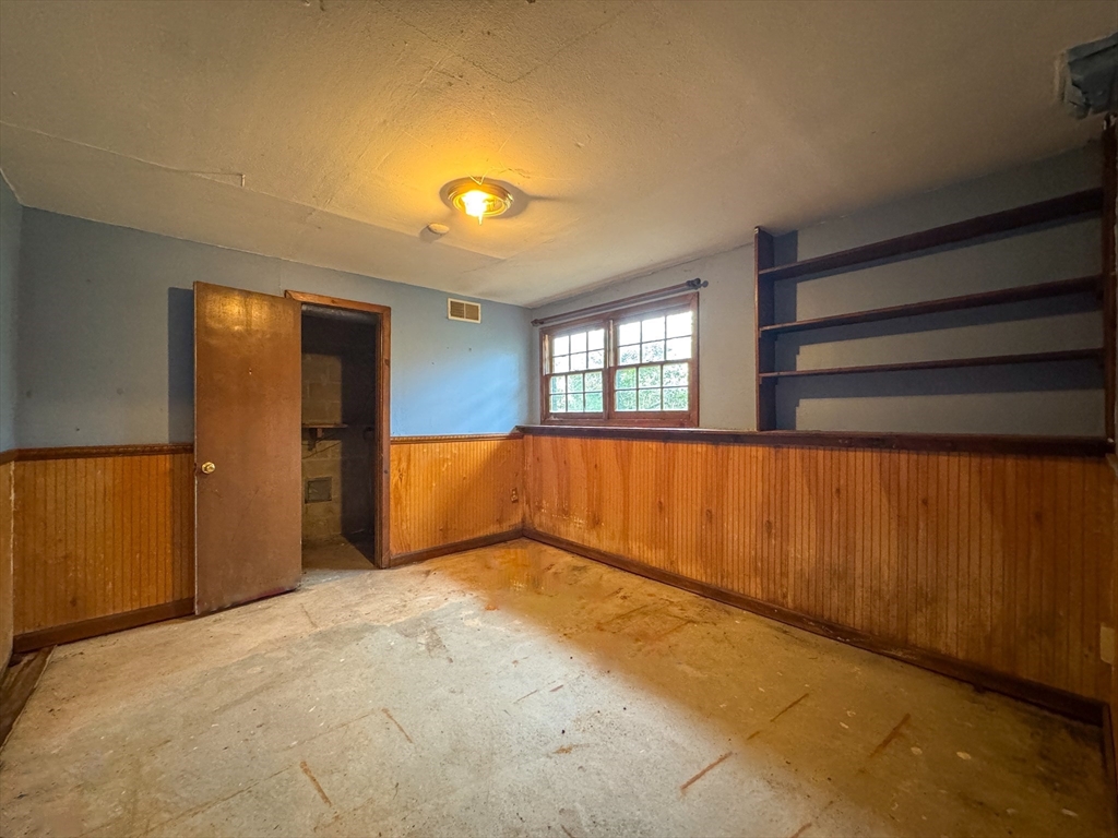 60 White Fox Road Feeding Hills, MA 01030 - Photo 17 of 29 a view of an empty room with a window
