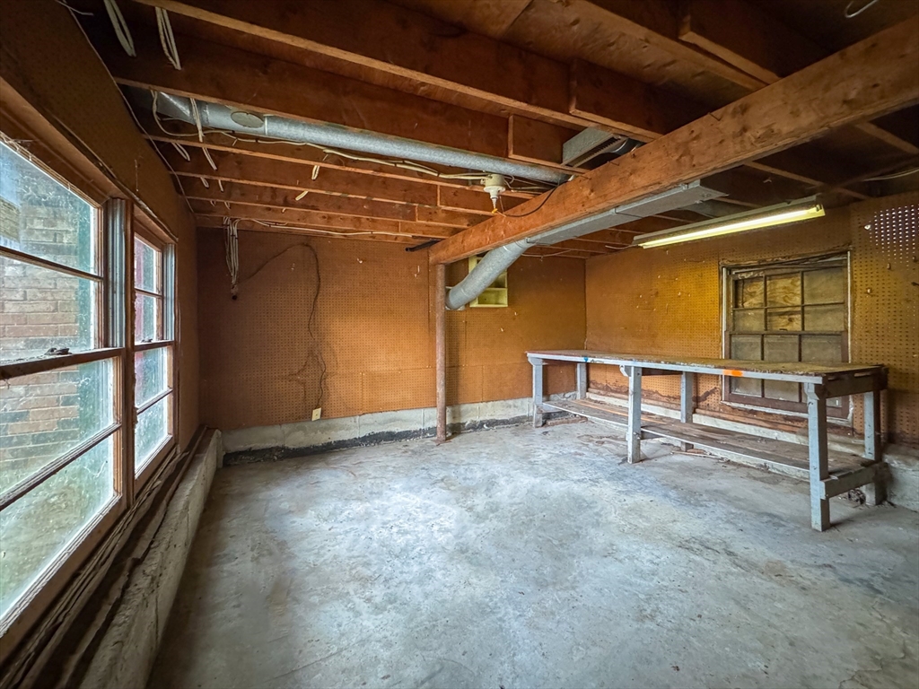 60 White Fox Road Feeding Hills, MA 01030 - Photo 26 of 29 a view of an empty room with wooden floor