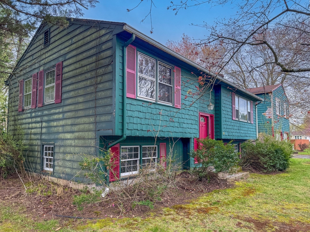 60 White Fox Road Feeding Hills, MA 01030 - Photo 5 of 29 a front view of a house with garden